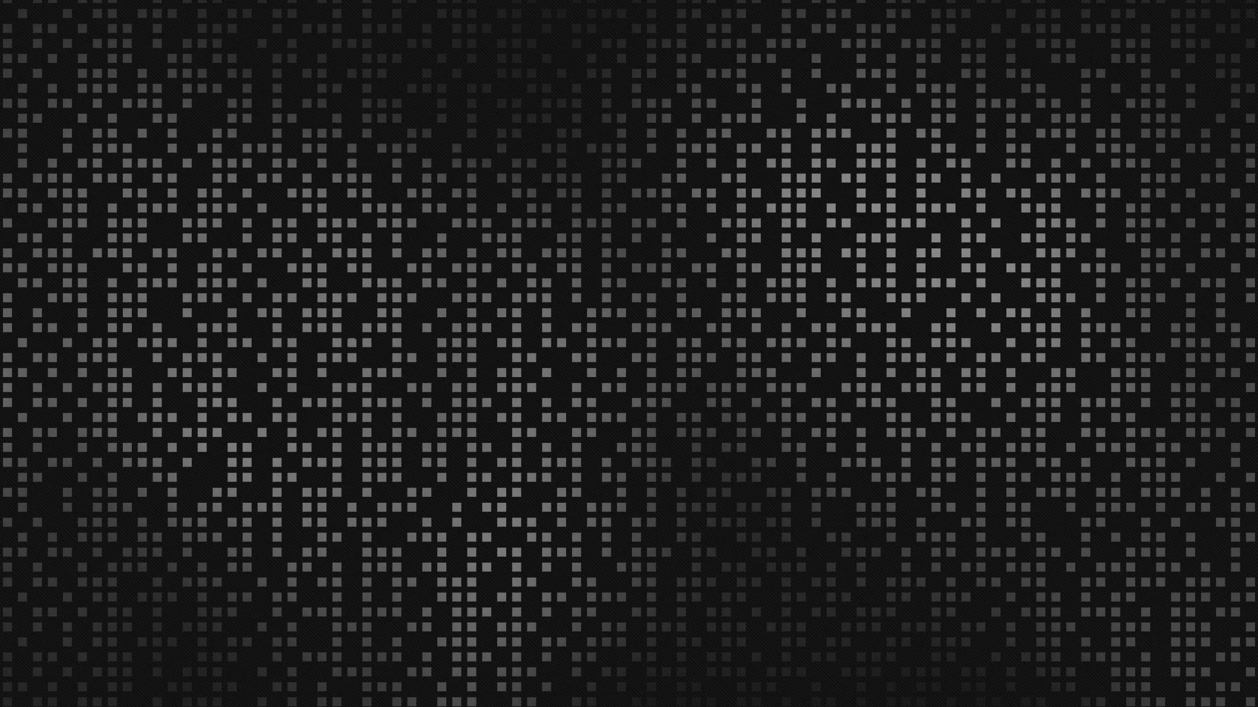 Abstract dark background of small grey and white pixel squares scattered in a halftone-style dot pattern