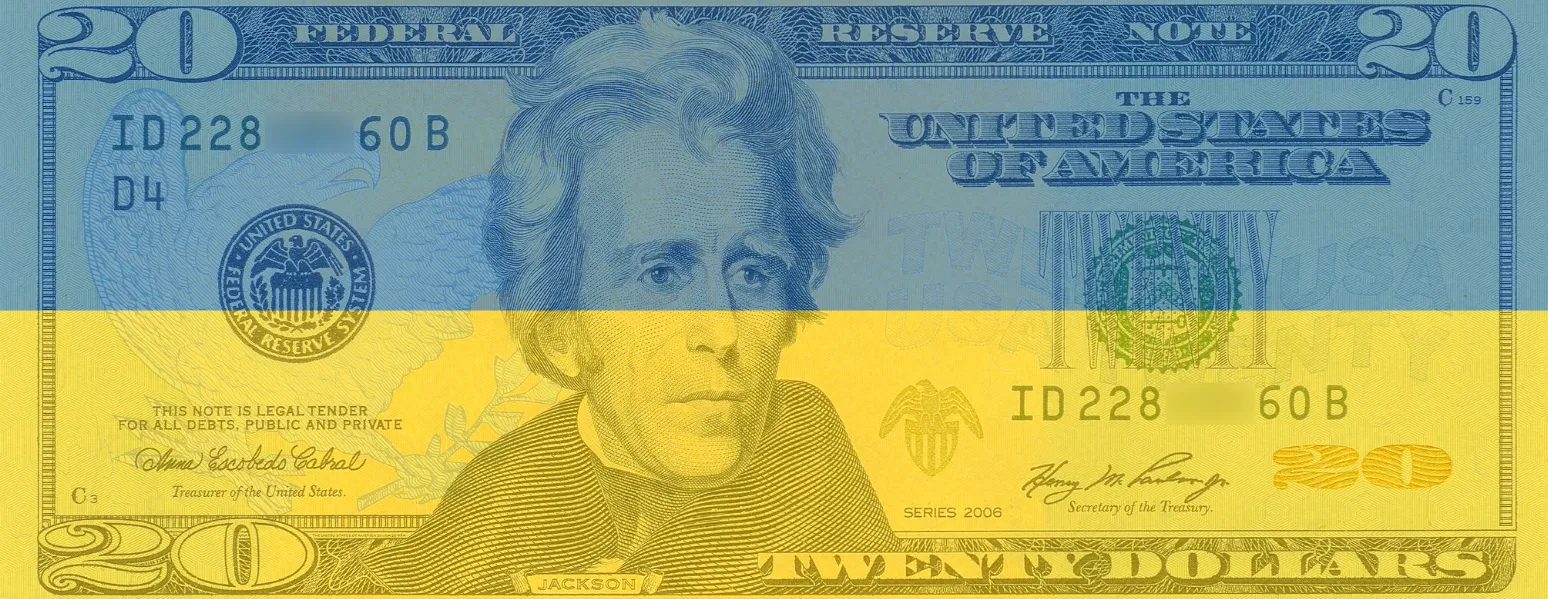 A US twenty-dollar bill overlaid with the blue and yellow halves of the Ukrainian flag