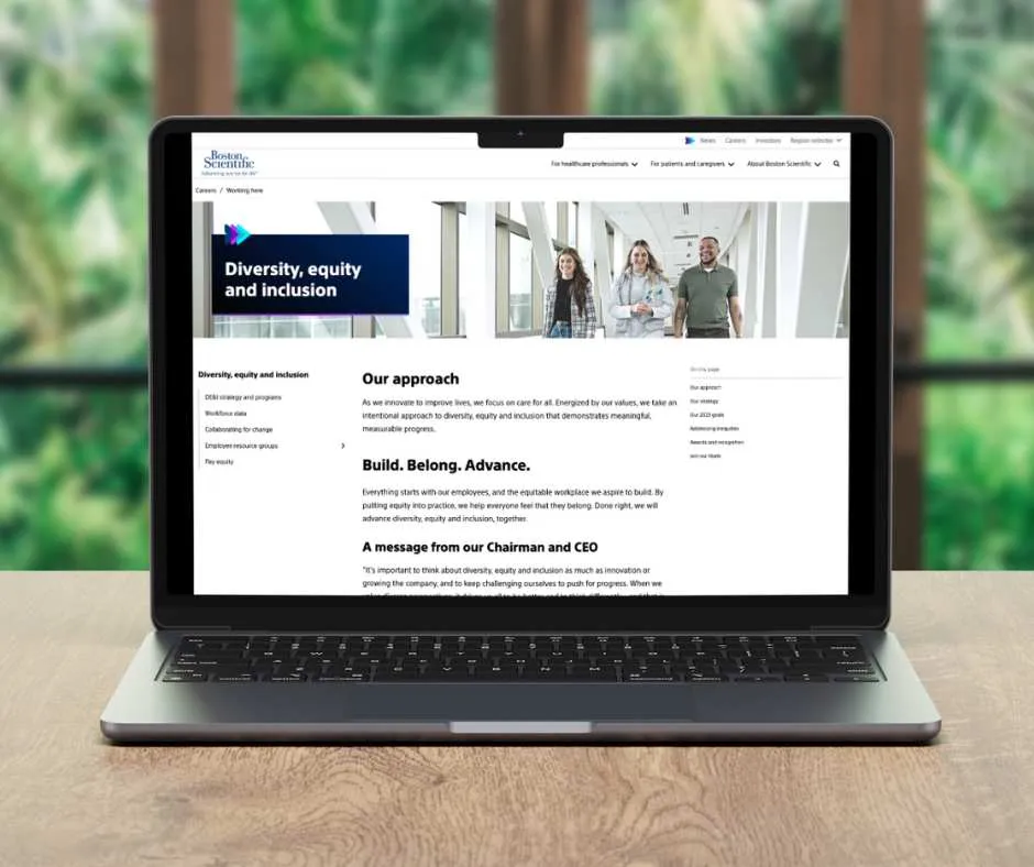 Laptop showing the Boston Scientific Diversity, equity and inclusion page with 'Our approach' and 'Build Belong Advance' sections